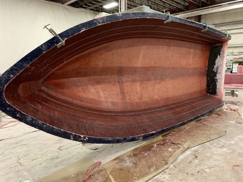 This is the 23 Venture Hull being laid up in our lamination shop.