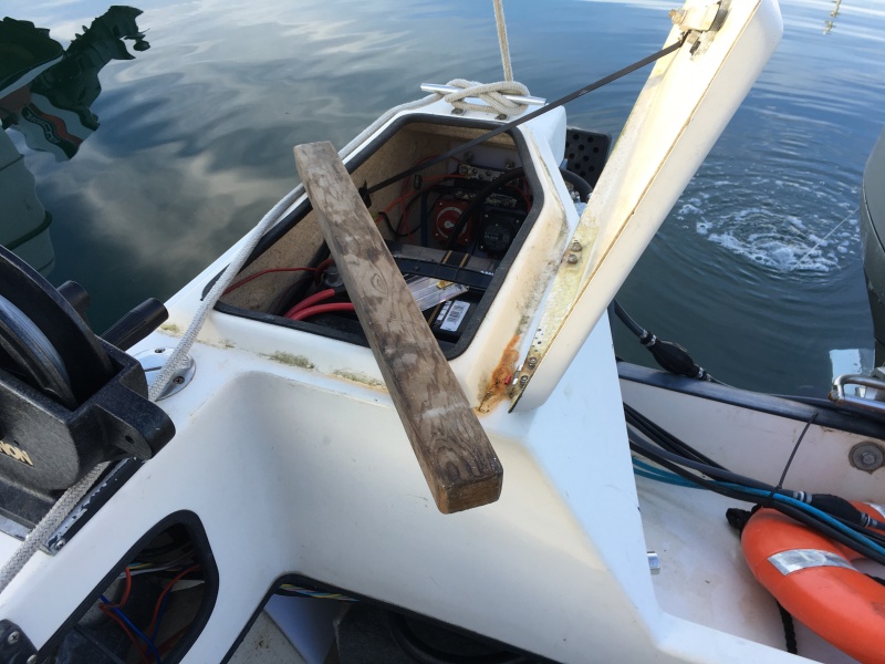 This piece of wood was wedged in the lazarette to hold the battery in place.