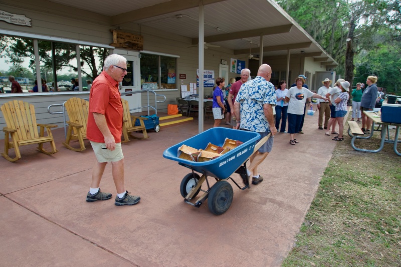'Tote that...wheel barrow full of chicken.  Tom--always the leader and laborer.