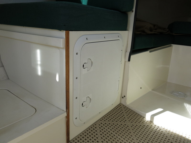 Underseat storage hatch