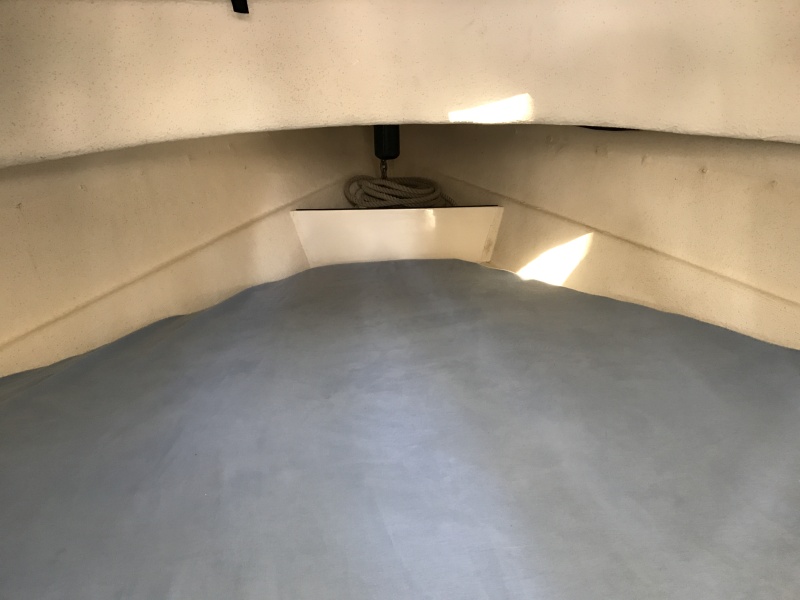 V-berth has standard foam cushions plus additional 3 inch memory foam in zippered blue denim cover. See additional photos in modifications album.