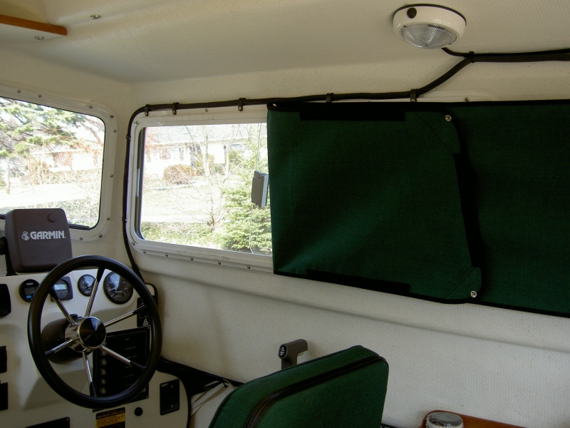 (Valkyrie) Factory window cover with extra snaps added for ventilation and privacy at night.  Double sided snaps were used.  Also snaps were added at mid-point and forward because the velcro-tape would fall off in hot weather.