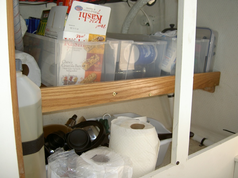 (Valkyrie) Final product.  Oak galley shelf doubles usable space under galley.  Shelf is 19" deep and the width of galley.  Three inch fiddle keeps stuff from doing a backflip in a seaway.
