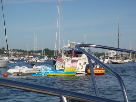 Various water toys right up in front of our raft of of three C-Dory's waiting for tonights July 3rd firewoks display