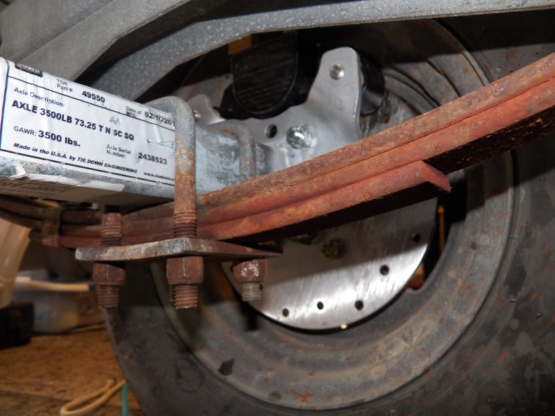 Very tight fit.  I had to bend some little stainless clips because they were interfering with the wheels.  I learned after reassembling that rusty leaf springs make for a rough ride because of "stiction."  Pulling them off (using an air wrench), sandblasting, and painting isn't too complicated and I may do that.