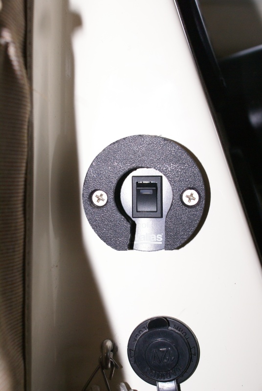 Wallas 1300 Install -DSC06163 - Protection against inadvertently bumping the switch on or off made from a small scrap of 1/2" starboard