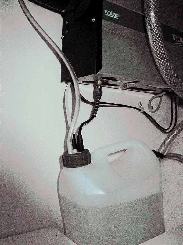 Wallas fuel jug below heater.