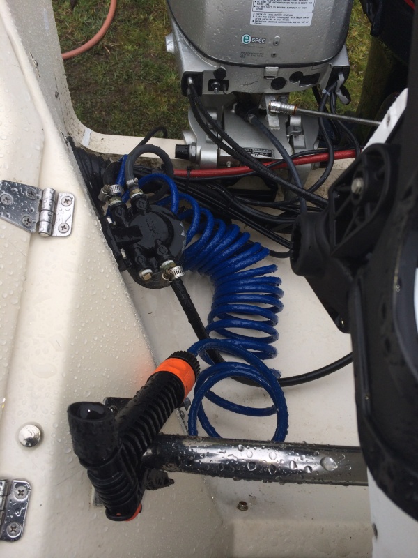 wash down hose ran better through boot than original plan. there is a hook on table I need to switch to this side and spray nozzel will hook onto