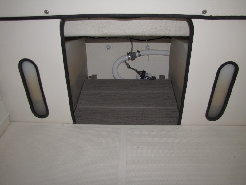 Wasted space before.  Keeps items off of bilge well. 2/14/11