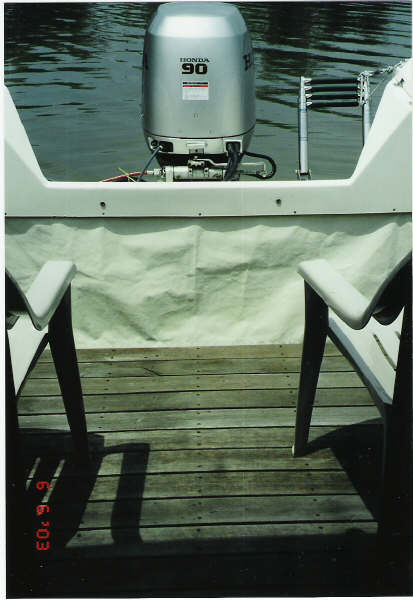 We now have a rug on the deck and that curtain to hide gas tanks has lost its wrinkles.
