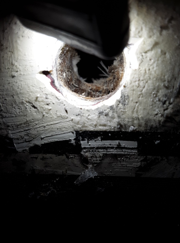 Wet core in the outboard mounting hole