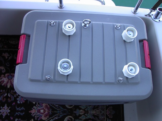 White plastic 2" to 1/2" PVC pipe bushings (reducers) make perfectly formed cups for Honda generator feet. Weight rests on fender washers, boltheads fit up into the generator's feet screw holes, and outer edge of bushing cups feet so they don't slip around.