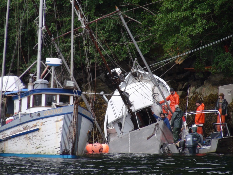 Working to get her free & afloat